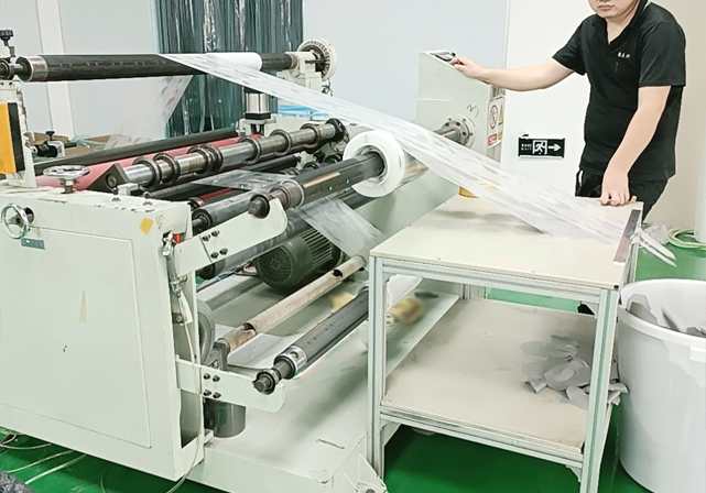 Automatic film covering machine